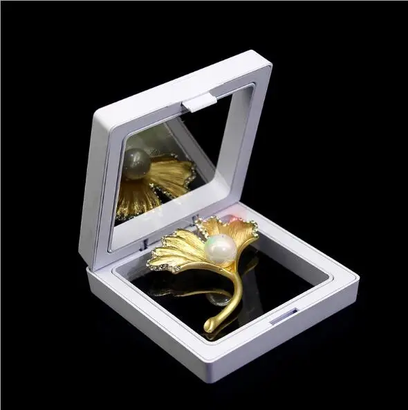 

2019 jewelry packaging suspension box transparent elastic film jewelry brooch jewelry box photo frame display box jewelry box