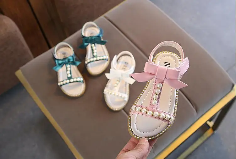 Летние модели детские сандалии девушки принцесса красивый бриллиант лук обувь дети плоские сандалии для маленьких девочек римская обувь