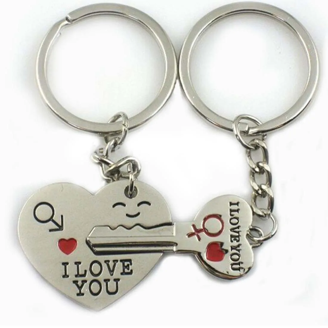 брелки для влюбленных. брелок для девушки. парные брелки для друзей. брелок сердечко на питбайк цурикова. ключ сердце брелок.