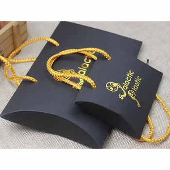 

Custom logo paper pillow gift hanger box black background gold foil gift box pillow shape with gold string