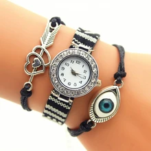 Nuevo reloj mujer marca de lujo amor flecha corazón ojo Vintage pulsera de cuarzo relojes de pulsera de cristal remache reloj 100 unids/lote