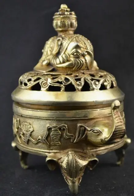 

Chinese ancient copper carved elephant hand hollow-out censer