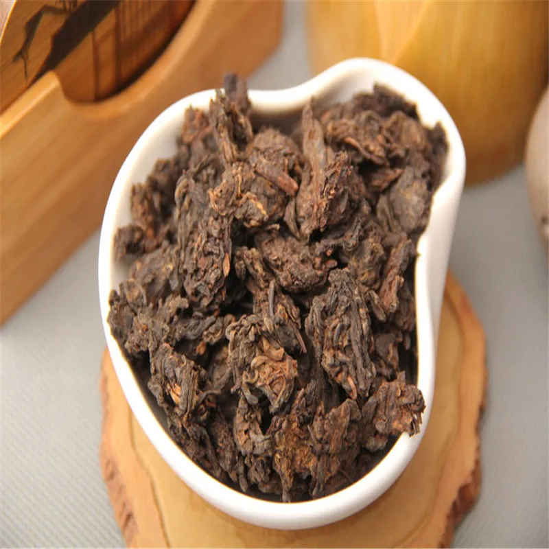 

HCX Yunnan tea scattered old 2002 years old tea tea premium Menghai gold tea buds small head head