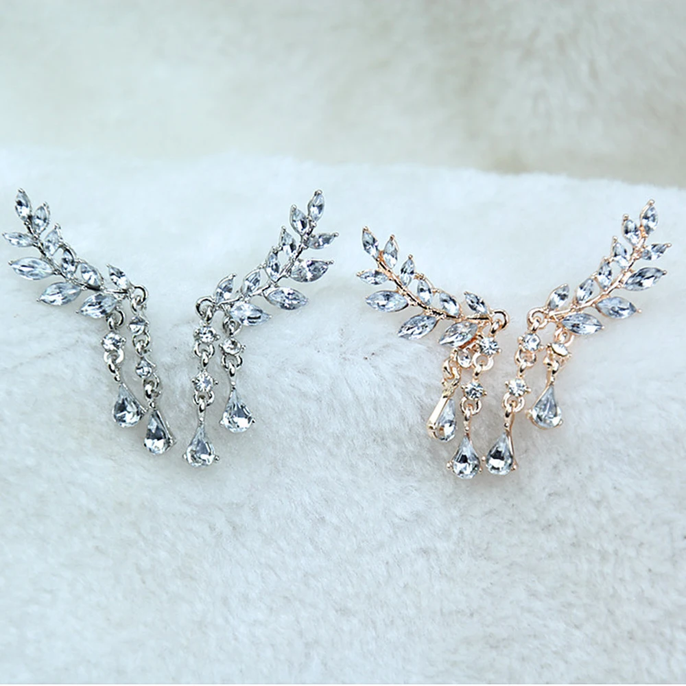 Женские серьги гвоздики с крыльями ангела инкрустированные стразами сплав
