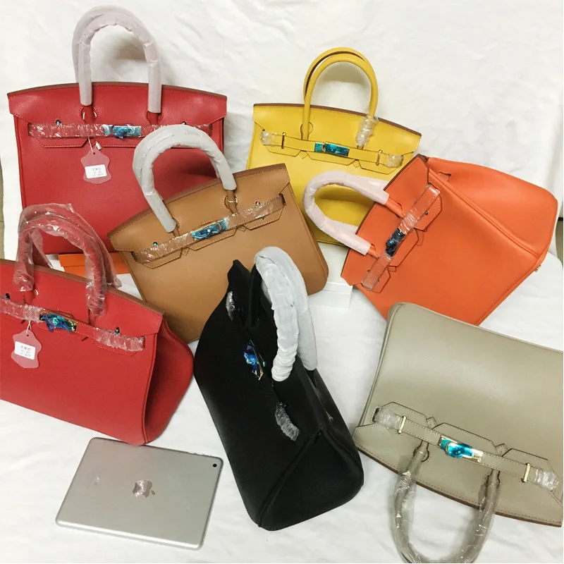 

free shipping The new 2019 female hand palmprint cowhide cross grain leather handbag shoulder portable oblique crossbody bag