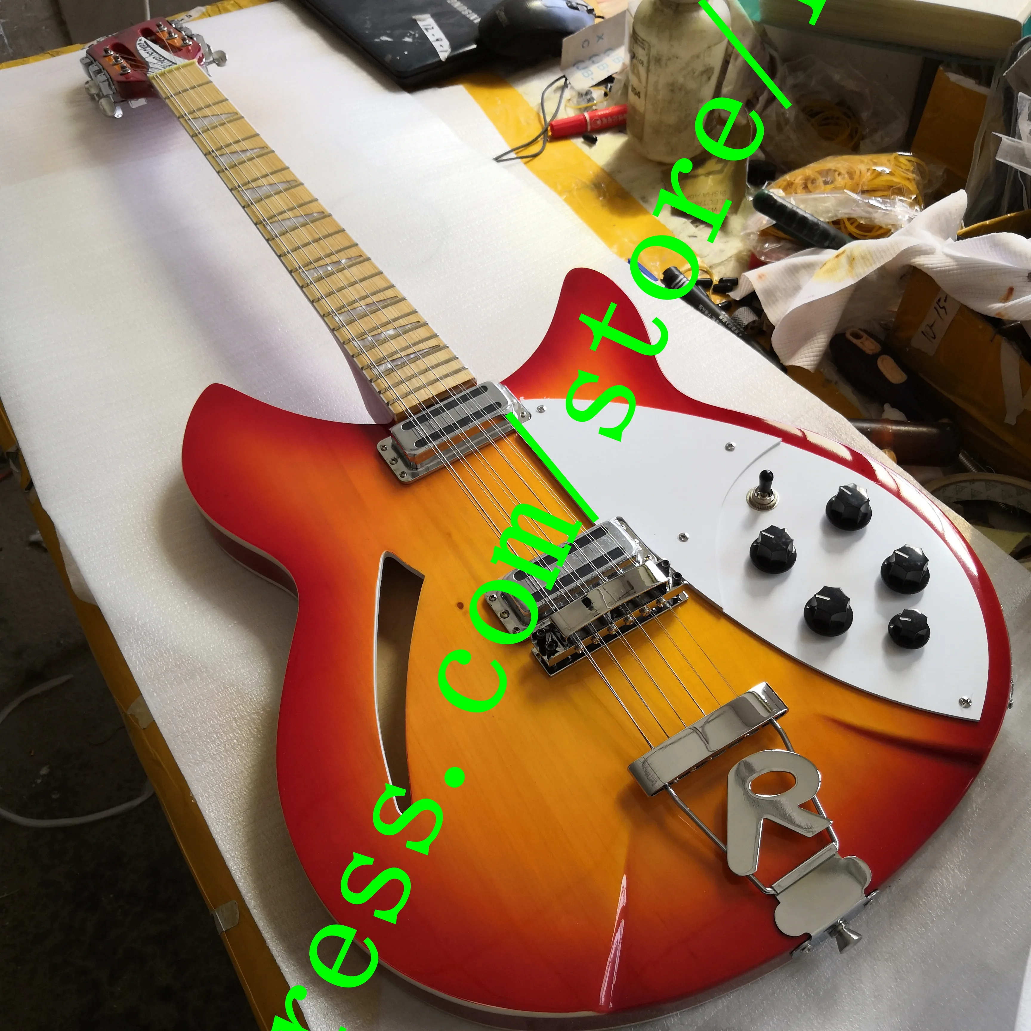 

12-string 360 model electric guitar with two outputs lacquered maple luster fingerboard.