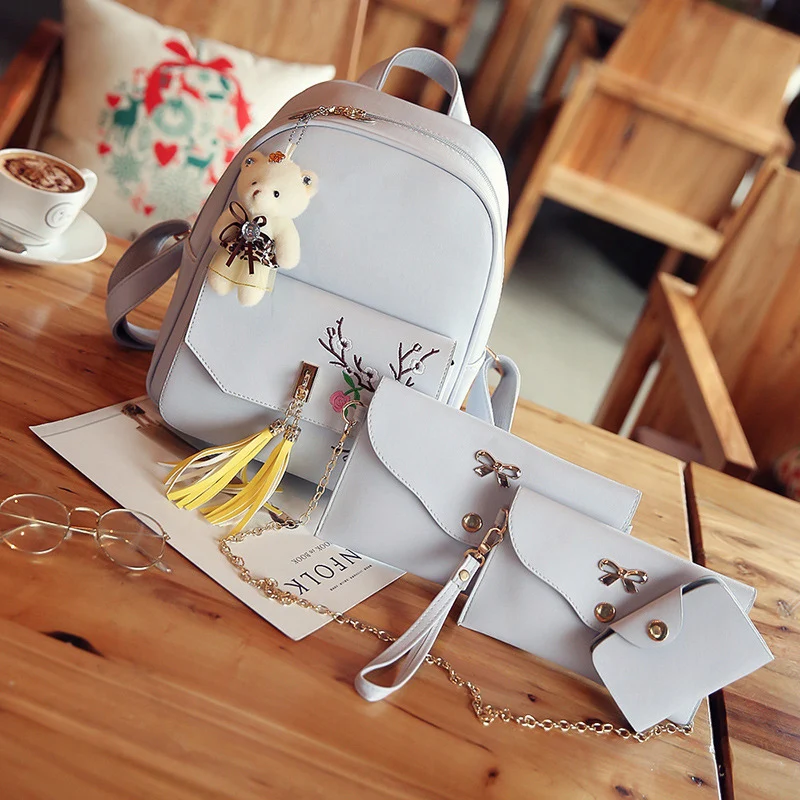 

2018 new Korean embroidery student backpack four-piece casual backpack small fresh female bag