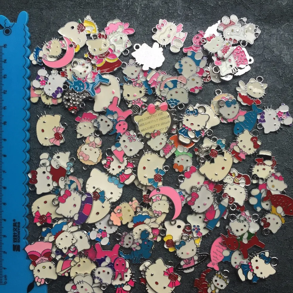 

20pcs cartoon hello kitty mix Metal Charm Necklace bracelet Pendants DIY Jewelry Making Mobile Phone Accessories