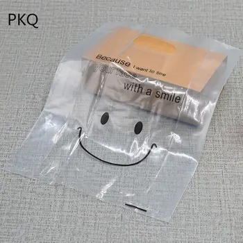 

50pcs Cute Small Smile Plastic Bags with hand, Christmas Gift Packaging Bags Wedding Candy Bag,plastic bags for store