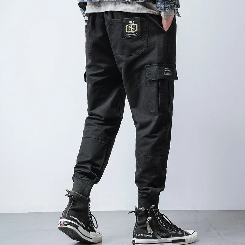 Tide brand men's casual pants spring and summer new overalls men's stitching Slim beam feet pants casual bag trousers