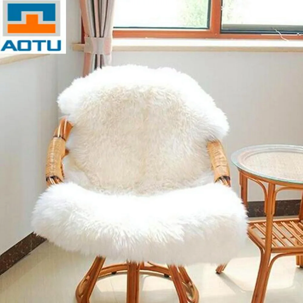 

AOTU Super Soft Faux Sheepskin Chair Warm Hairy Floor Carpet Seat Pad Plain Skin Fur Plain Fluffy Area Rugs Washable Bedroom Mat