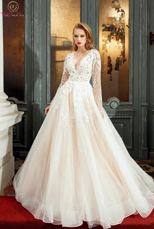 

Illusion Wedding Dress Transparent Buttons Back Lace Tulle Appliques Court Train A-line Sexy Full Sleeves Deep V-neck Gown