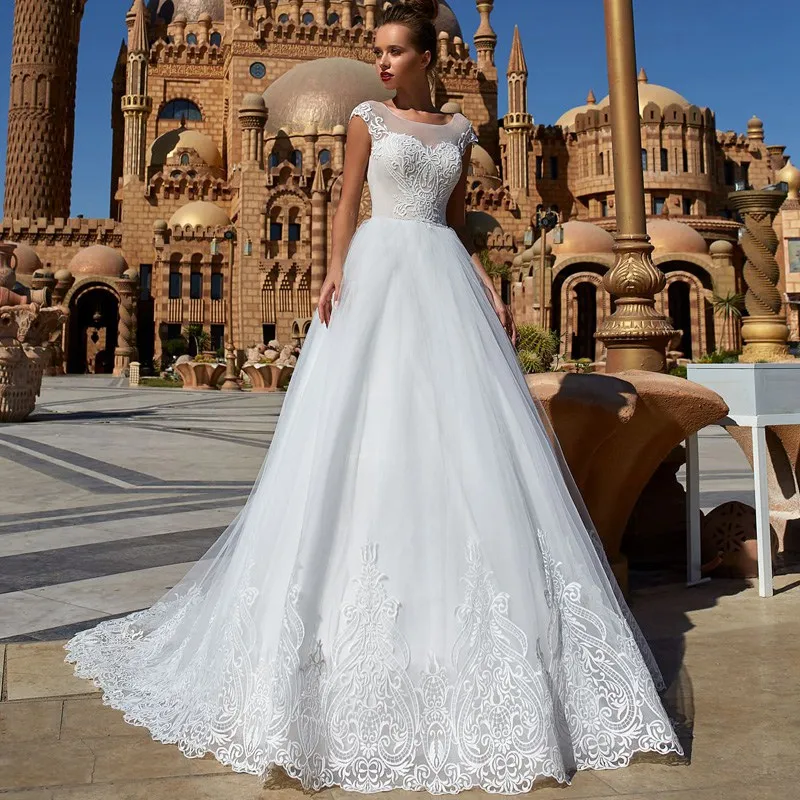 

MANYUNFANG Top Quality Lace Princess Wedding Dress Lace Appliqued Cap Sleeves Bride Dress A-Line Backless Boho Wedding Gown