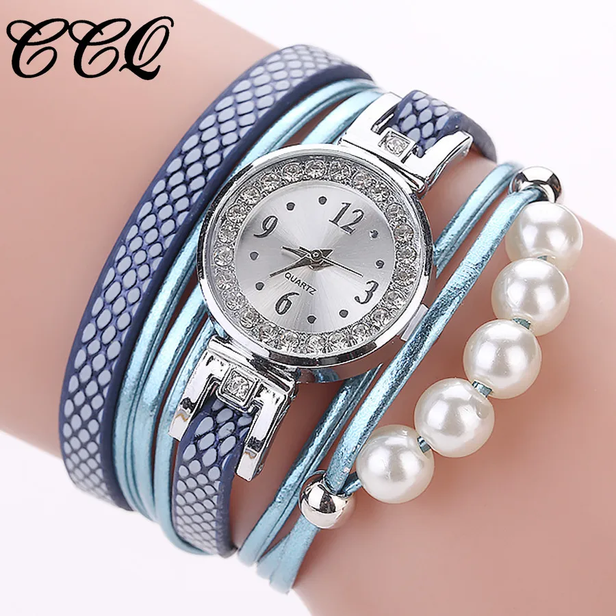 

CCQ Women Fashion watch sports woman Casual Analog Quartz Wing Rhinestone Pearl Bracelet Watch free shipping #30