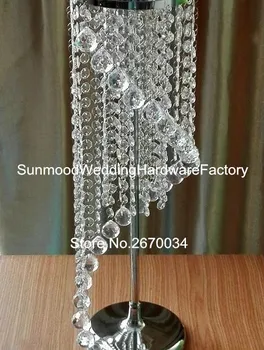 

Gorgeous wedding flower stand centerpiece with hanging crystal