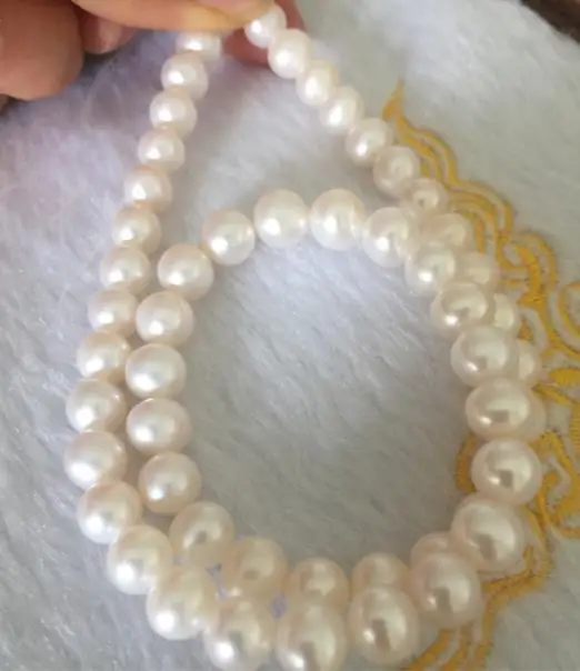 

charming round south sea 9-10mm white pearl necklace 18inch 14k