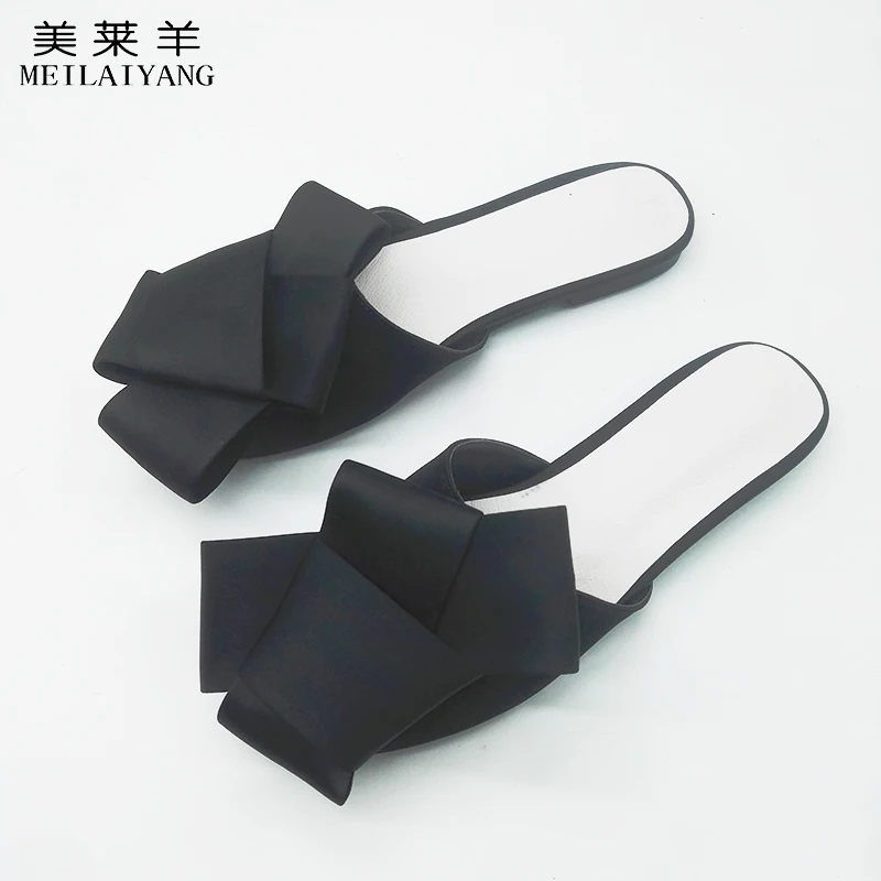 black flat mules with bow