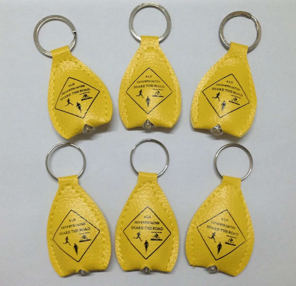 

Customized logo printed with LED light Key Chain Keyrings fashionable book bags Leather keychain 1000pcs/lot Free Shipping