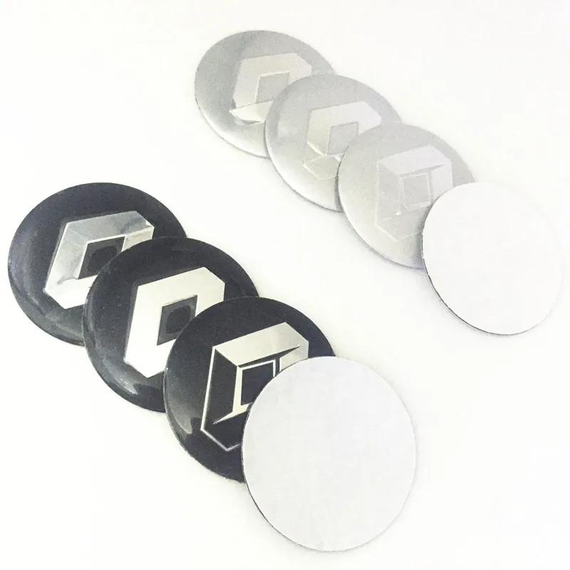 

4 pcs Car-Styling Car Wheel Tire Center Sticker For Renault 2 Button Clio Scenic Megane Duster Sandero Captur Twingo Accessories