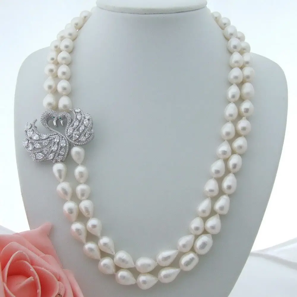

AB082405 22" 2 Strands White Rice Pearl Necklace CZ Pendant
