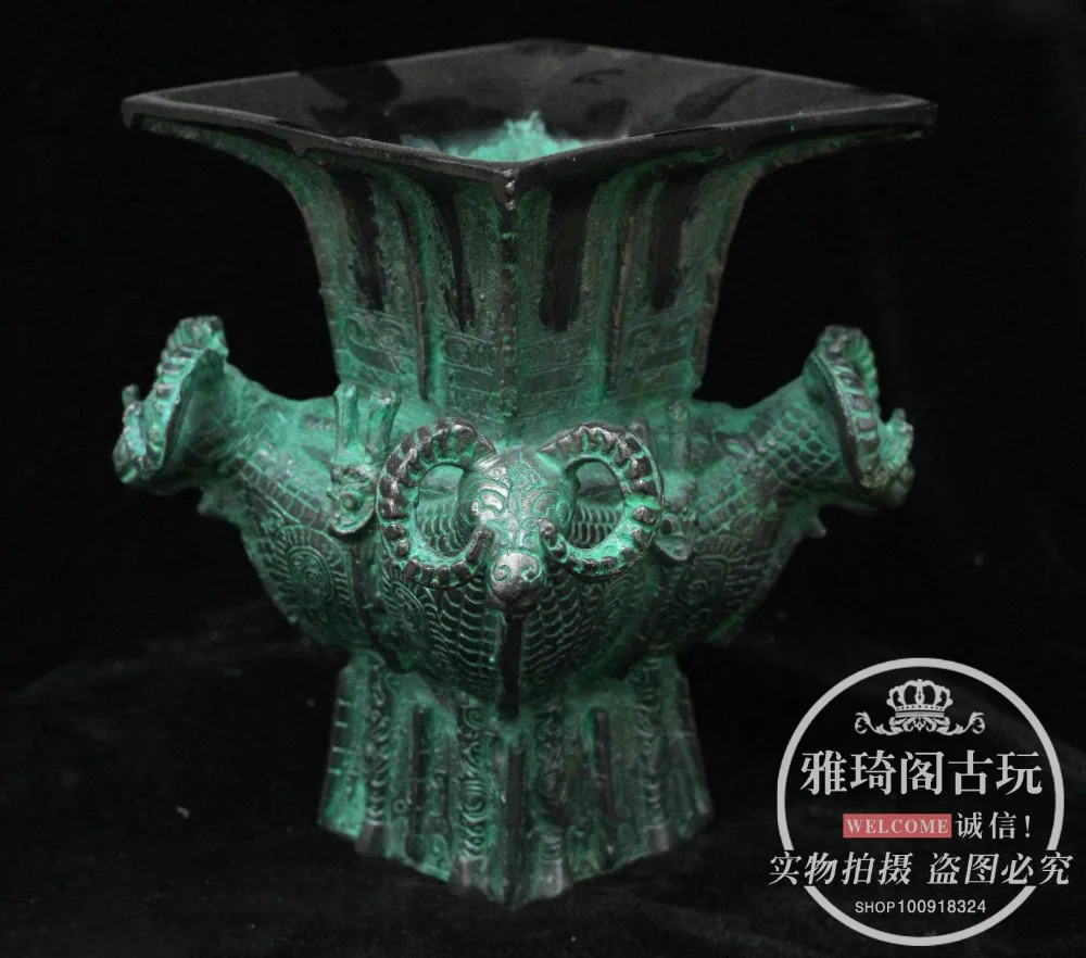 

China old bronze ornaments four sheep bronze Ancient wine bottle