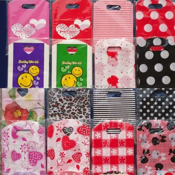 

50pcs Lots Wholesale Pretty Mixed Pattern Plastic Gift Jewelry Packing Bag Shopping Bags Pouches 15X9CM