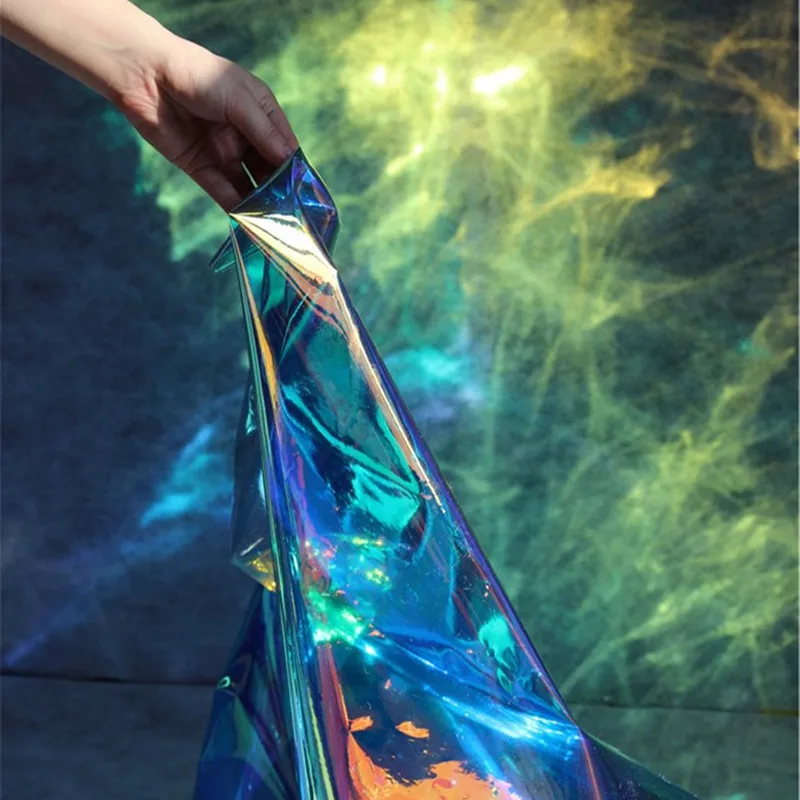 

100x100cm/piece Thin Ice Blue TPU Designer Fabric, Mirror Color Radium Colourful Creativity Of Waterproof Cloth In Clothing Bag
