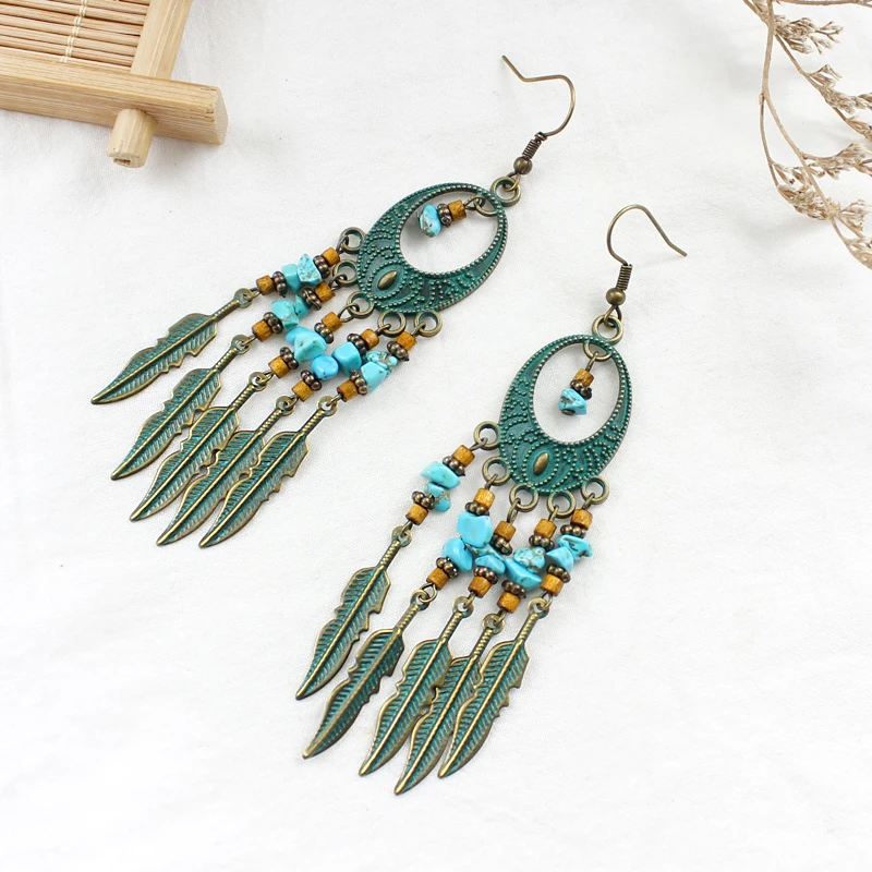 

Imitation bronze hollow oval suspension blue stone string beads Hanging metal leaf fringe pendant earrings Creative ethnic style