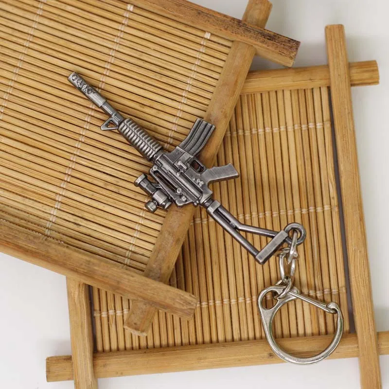 Retro Mini Rifle Revolver M4A1 Gun Key Chain Metal Weapons Men's Key Chain Hot Game Pendant Keyring Jewelry Cool Souvenirs Gifts Retro Mini Rifle Revolver M4A1 Gun Key Chain Metal Weapons Men's Key Chain Hot Game Pendant Keyring Jewelry Cool Souvenirs Gifts