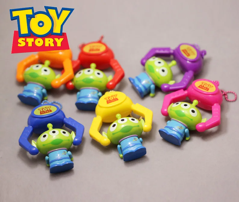 

Action 6 PCS/Set Toy Story 4 Aliens Claw Vending Machine Shape Pendants Three-eyes Alien Toys Kids Gift Toy Story 4 Squeeze Toys