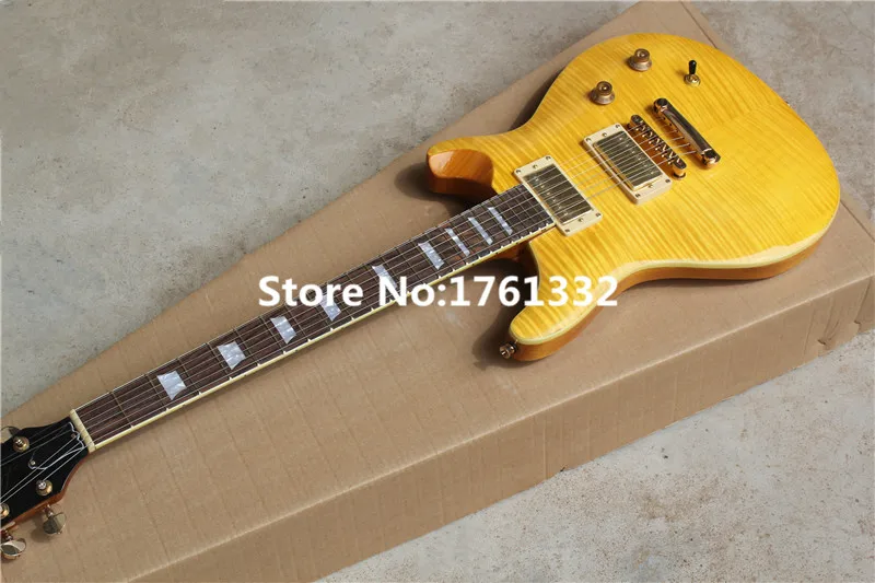 

Factory custom transparent yellow body electric guitar with flame maple veneer,gold hardware,fixed bridge,can be customized