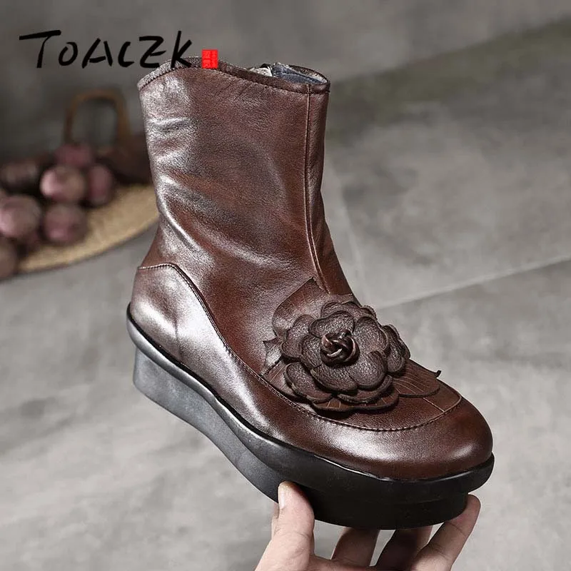 

Autumn and winter new thick-soled boots women's national wind leather flowers flat comfortable round head single boots