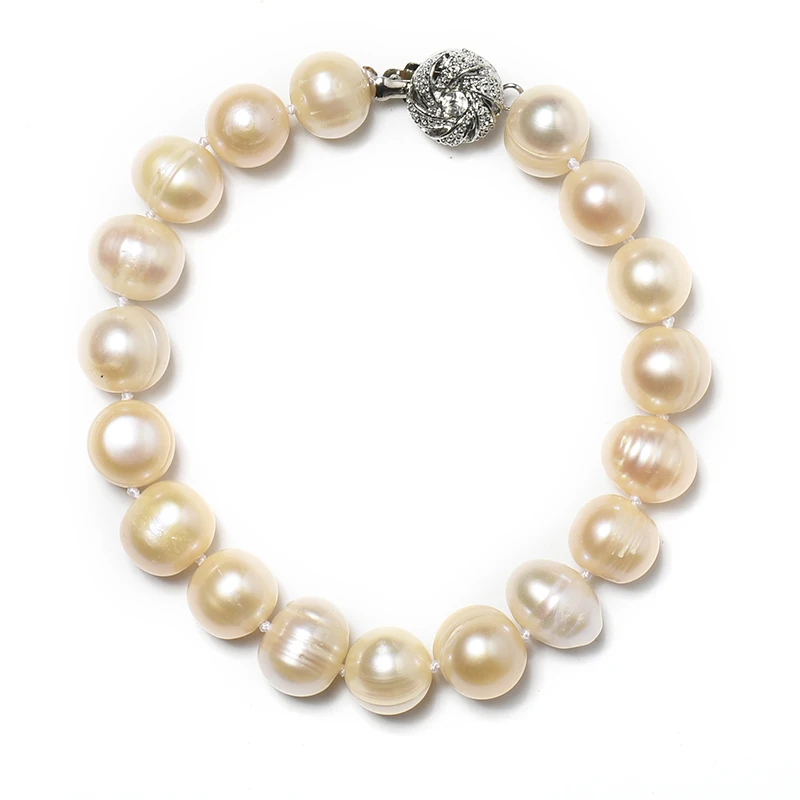 

The 10-11 mm Freshwater Natural pearl Bracelet WITH Full and round pearls and Light Yellow color