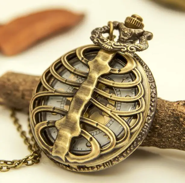 

Wholesale 10 PCS/lot Bronze antiques Hollow out gold surface of quartz woman and men gift steam punk Necklace pocket watches