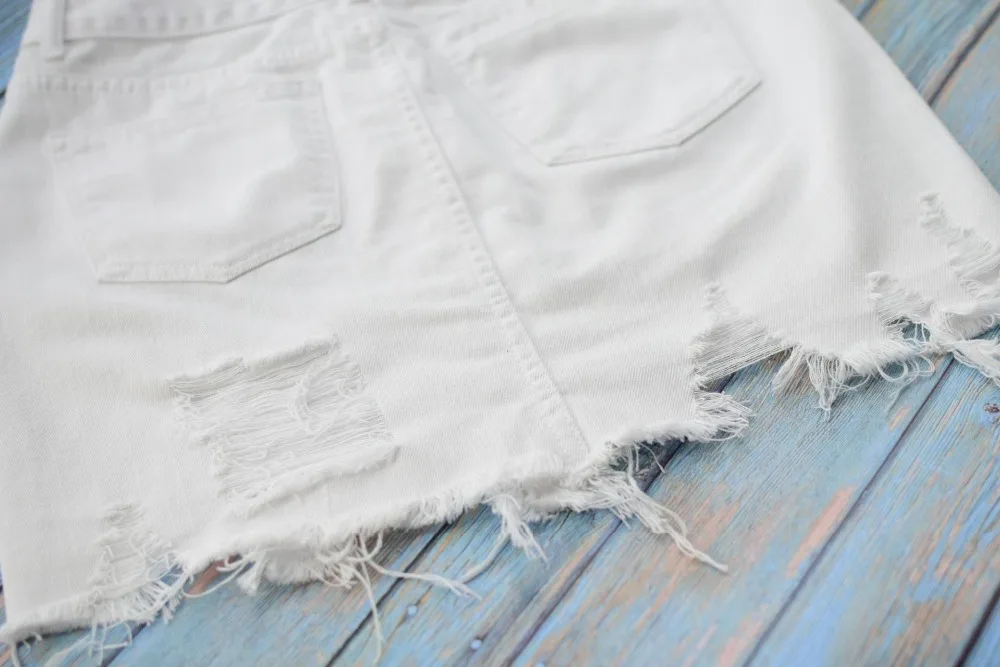 Women's high waist hip half skirt in pure white irregular worn foot tassel spring summer popular wild (25)