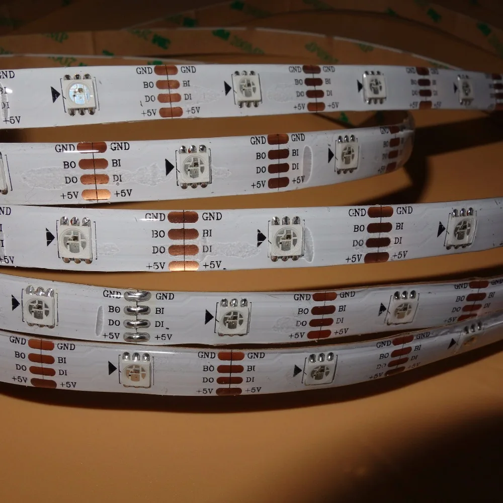 

WS2813(WS2811 protocol) addressable 5m 30LEDs/m DC5V RGB led pixel strip,waterproof by silicon coating;IP65,30pixels/M;WHITE PCB