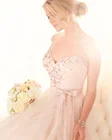 Save 29.8 on Princess beaded straps Bridal Ball Gown Bold Beaded Detailing sweetheart neckline skirt shimmers under soft light