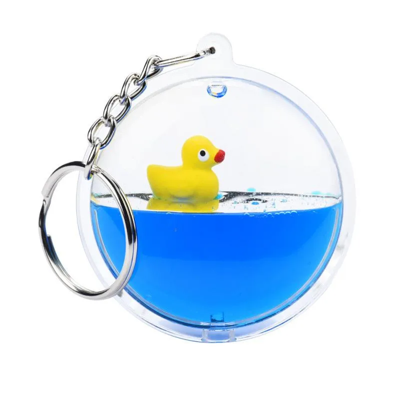 

Moving Liquid duckling keychain cartoon Filled Round Bottle Keychain Car Key Pendant Gift Delicate funny keychain