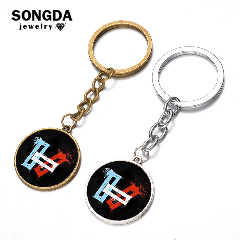 

SONGDA 21 Pilots Keychain Rock Music Band Twenty One Pilots Series Key Ring Music Fans Badge Bag Pendant Key Chain for Men Women