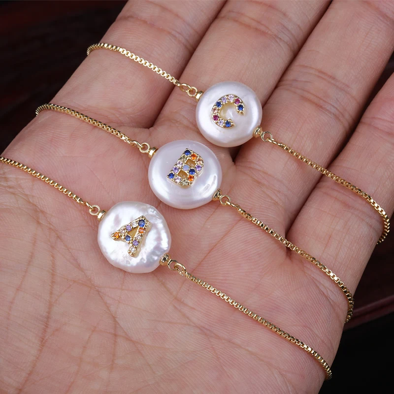

New Arrival Color Gold Micro Pave Rainbow CZ Cubic Zirconia 26 Initials Letter Charm Freshwater Pearl Gold Bracelets For Women