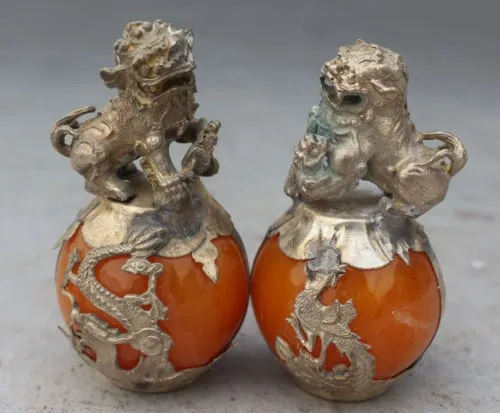 

A Pair of Elaborate Chinese Tibetan Silver Dragon Phoenix Artificial Amber Foo Fu Dog Lion Statues.