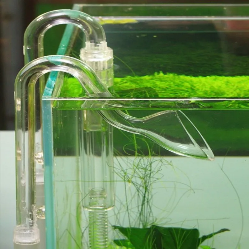 

The outside cylinder of the aquarium pipe is filtered and the outlet water is flowing out of the pipe with oil removing