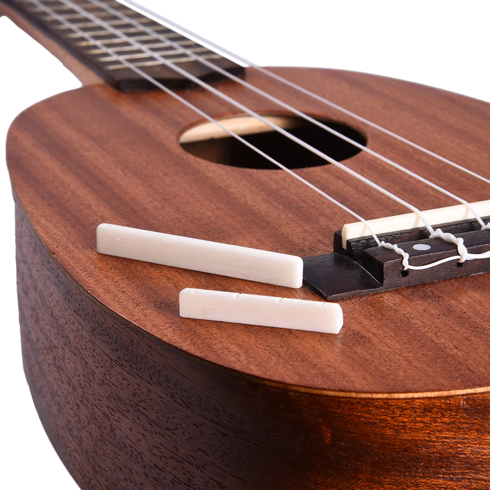 

High Quality Beige Buffalo Bone Bridge Saddle Nut Slotted For Ukulele Guitar Soft Pillow Easy Taking Musical Accessories