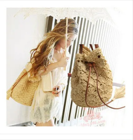 

New woven rattan straw bag Bucket string mouth beach summer spring hollow out bag 1pcs free post