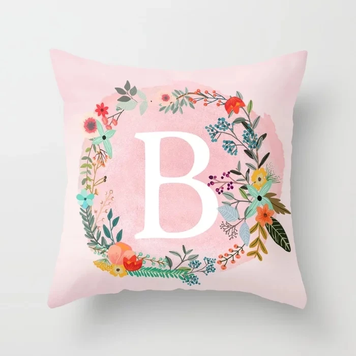 flower-wreath-with-personalized-monogram-initial-letter-b-on-pink-watercolor-paper-texture-artwork-pillows.webp