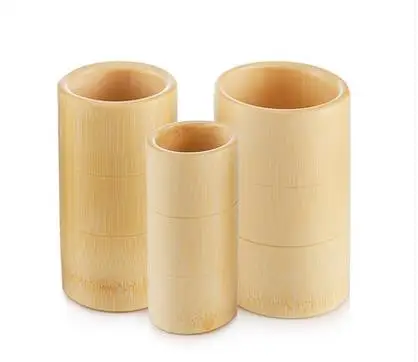 Бамбуковый баночный аппарат, большие натуральные баночки из бамбука в небольших бытовых типах. Три традиционные cupping-jfie56 всасывания