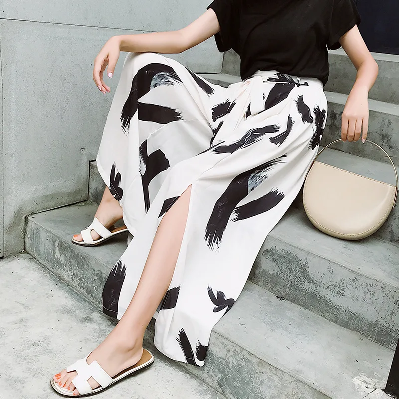 High waist loose summer chiffon pants plus zise printed trousers Korean version of casual pants women white wide leg trousers High waist loose summer chiffon pants plus zise printed trousers Korean version of casual pants women white wide leg trousers