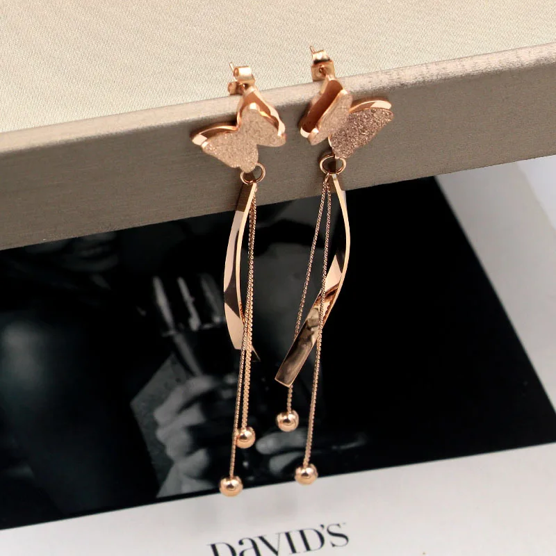 

Unique design Tassel Butterfly earrings Titanium Steel rose gold color Women long tassel beads Earrings, factory prices