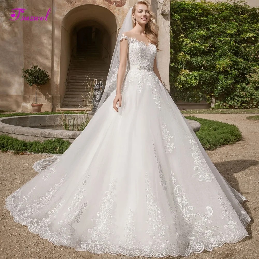 

Fsuzwel Romantic Scoop Neck Appliques Cap Sleeve A-Line Wedding Dresses 2019 Luxury Sashes Beaded Princess Bridal Gown Plus Size