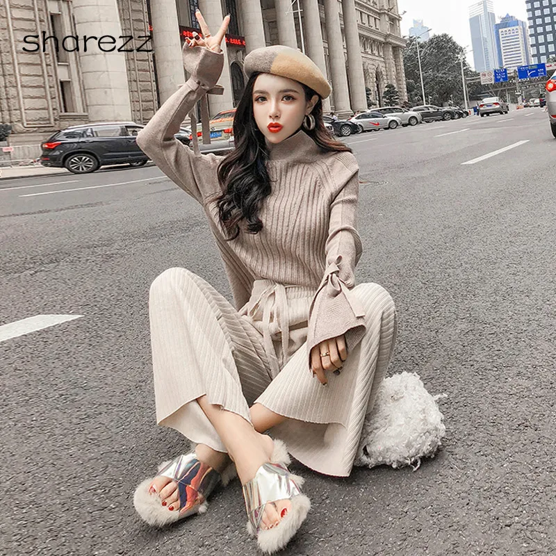 

Autumn and Winter Loose High Collar Flare Sleeve Bow-knot Knit Sweater + Loose Drawstring Wide Leg Pants Two-piece Suit